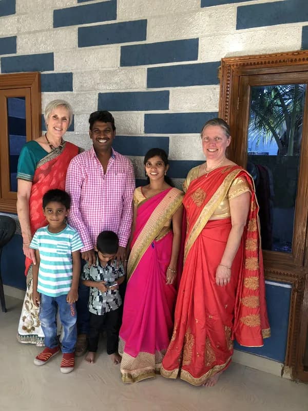 Valerie and Tracey with a St. John's family
