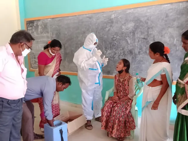 Covid-19 testing at St. John's, staff in PPE