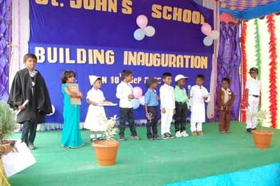 Students on stage at the building inauguration ceremony