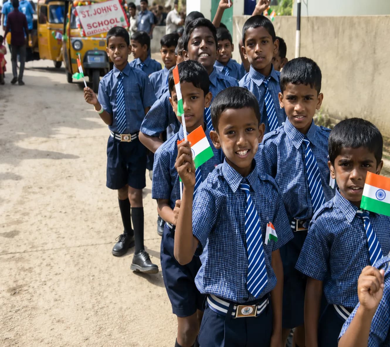 Students celebrating a cultural day with the Indian flag